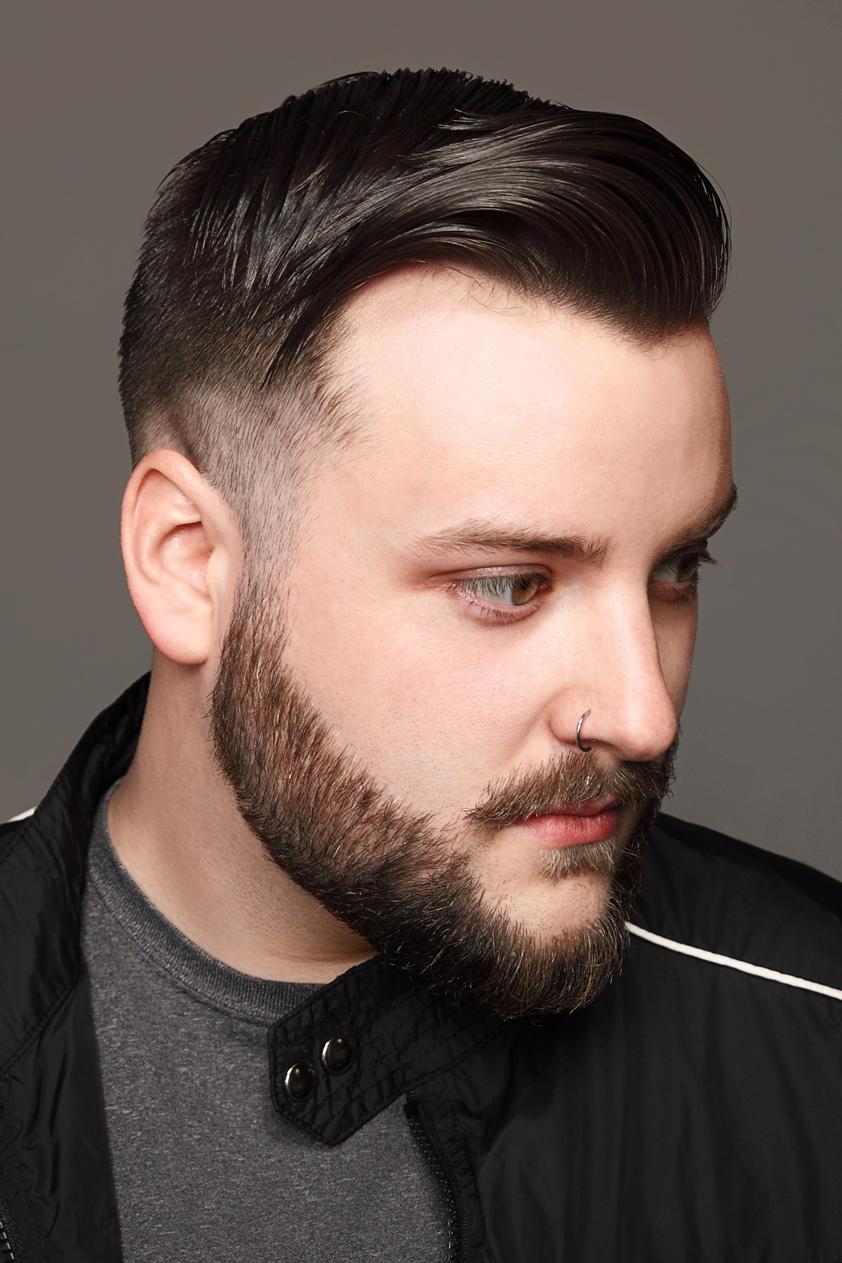 Mid fade haircut on a male